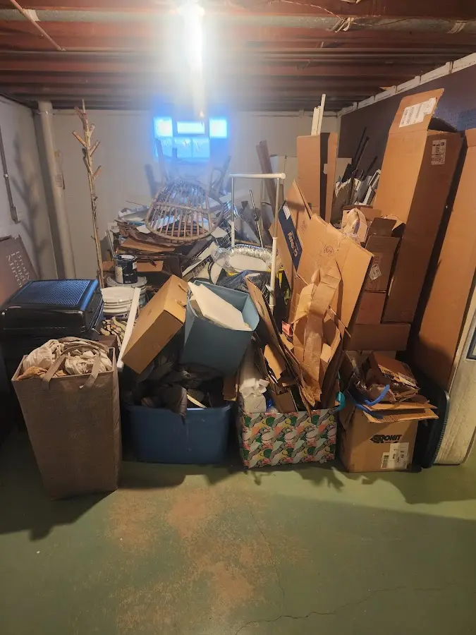 Roll-off dumpster container at job site for Construction Dumpster Rental in Penrose